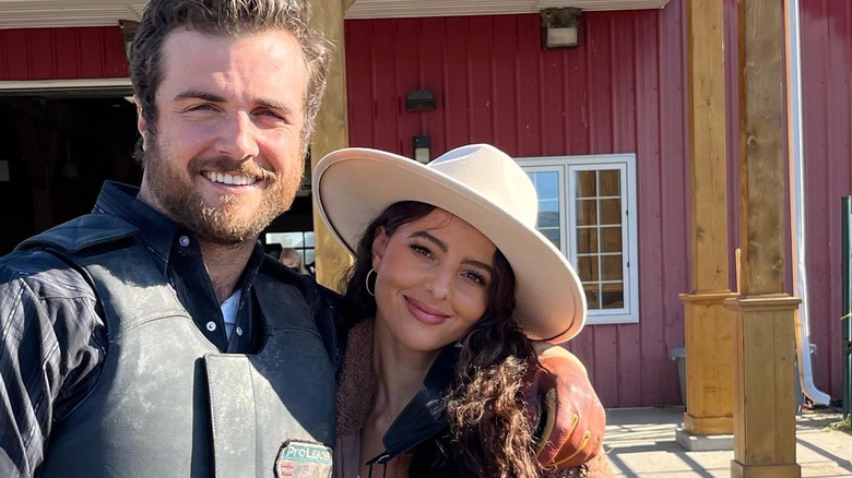 Beau Mirchoff posing with Jenny Meinen behind the scenes of Hallmark's "Ride"