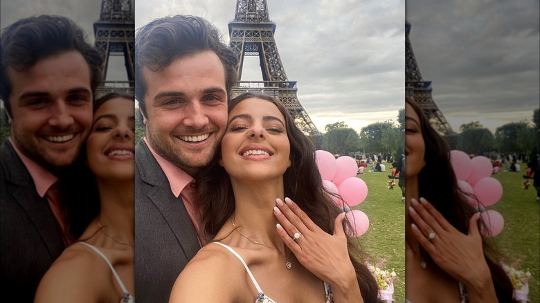 Beau Mirchoff and Jenny Meichen celebrating their engagement in front of the Eiffel Tower