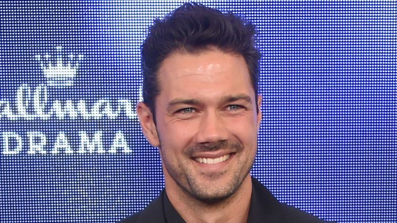 Ryan Paevey smiling