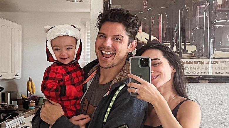 Sean Faris Cherie Jimenez smiling with their son Phoenix