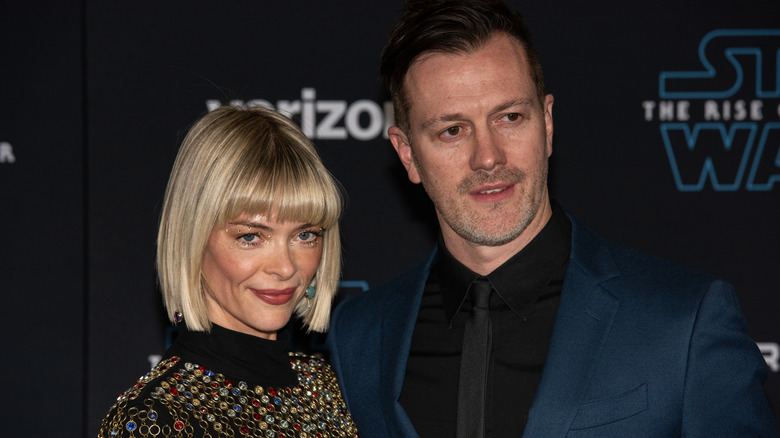 Jaime King and Kyle Newman posing for photos