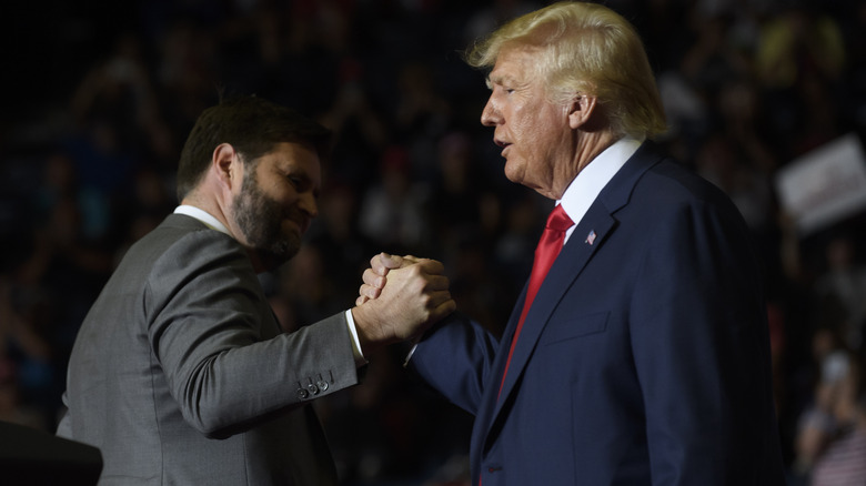 J.D. Vance shaking hands with Donald Trump