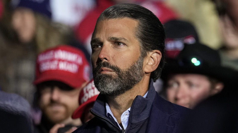 Donald Trump Jr. standing in a crowd