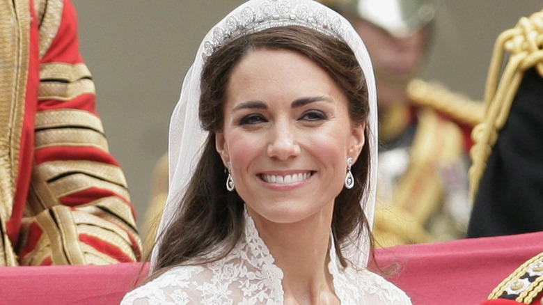 Kate Middleton smiling in wedding dress