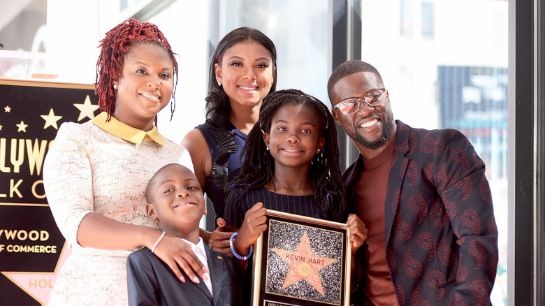 Kevin Hart with his ex wife Torrei Hart and their children and Eniko Parrish