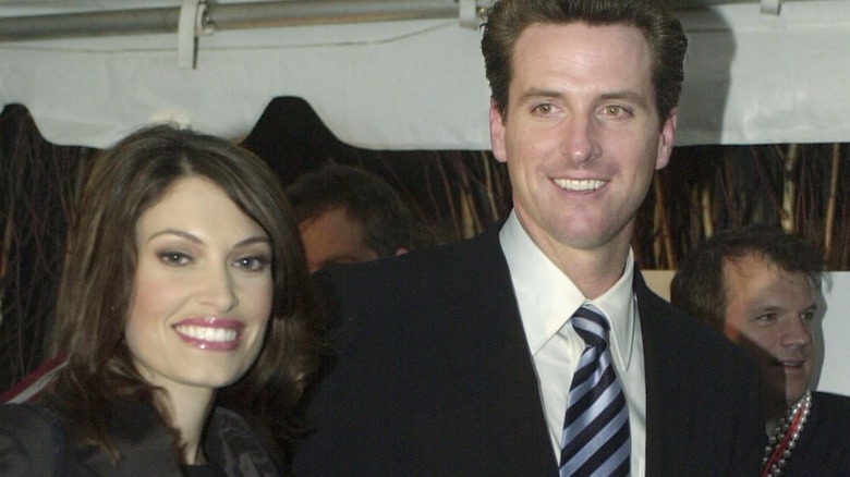 Gavin Newsom and Kimberly Guilfoyle smiling