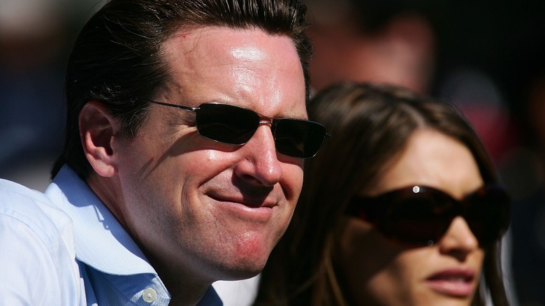 Gavin Newsom and Kimberly Guilfoyle wearing sunglasses