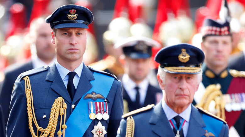 Prince William and King Charles walking