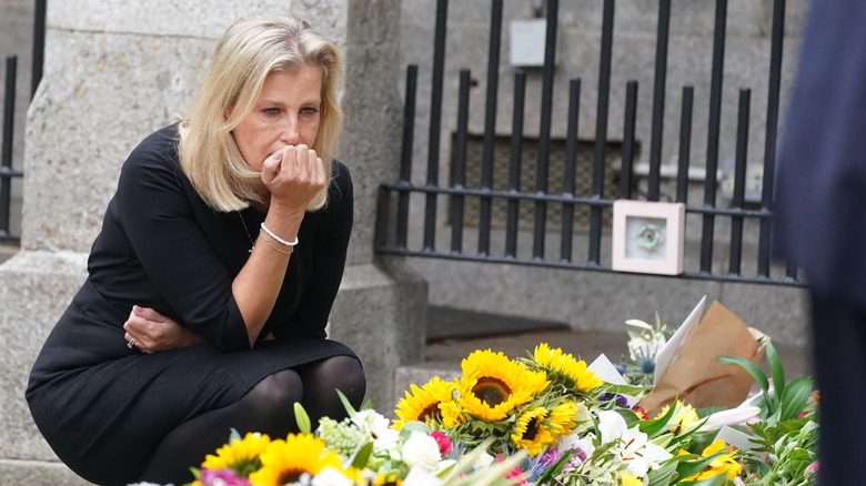 Sophie of Wessex looking at flowers for queen's death