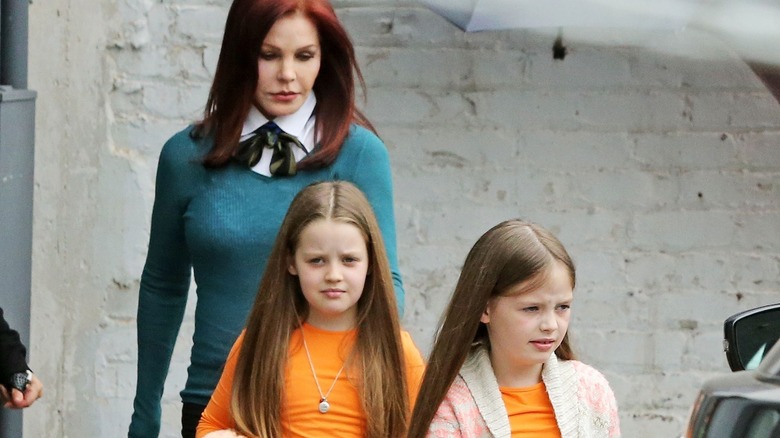 Priscilla Presley with twin granddaughters