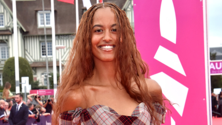 Malia Obama smiling on the red carpet