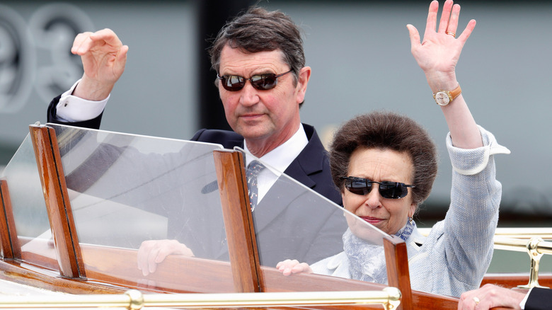 Sir Timothy Laurence and Princess Anne waving in 2015