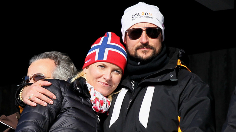 Pince Haakon hugging Princess Mette-Marit