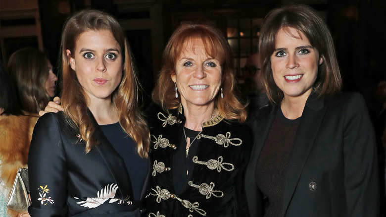 Princess Beatrice, Sarah Ferguson, and Princess Eugenie smiling together