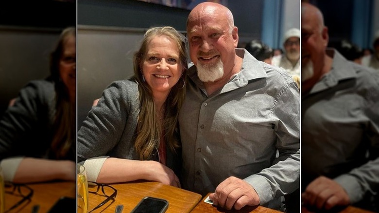 Christine Brown smiling with David Woolley