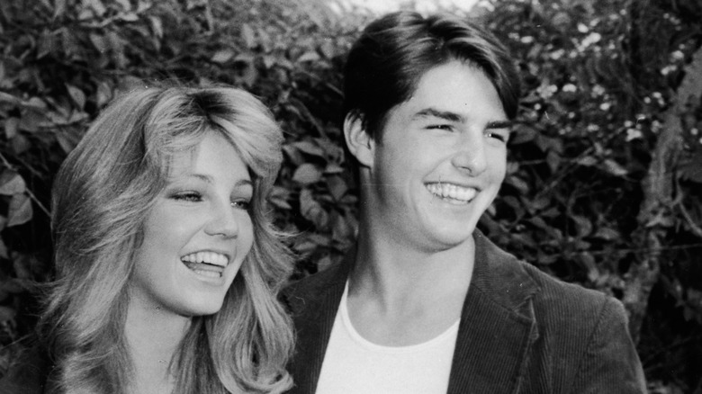 Tom Cruise and Heather Locklear with big smiles