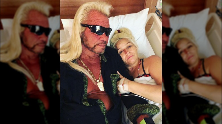 Dog the Bounty Hunter sitting in a hospital with his wife, Beth Chapman,