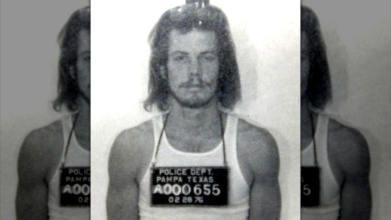 Dog the Bounty Hunter posing for a mugshot in 1976