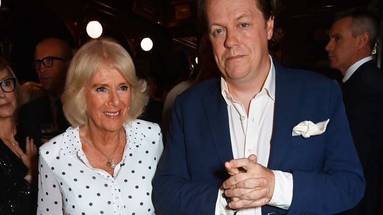 Tom Parker Bowles and Queen Camilla smiling