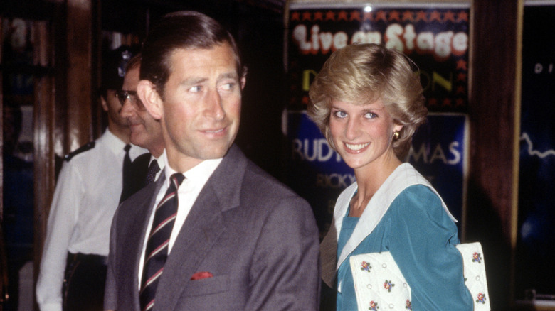 Prince Charles posing with Princess Diana