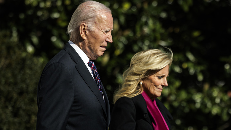 President Biden and Jill Biden walking together in a peaceful moment 