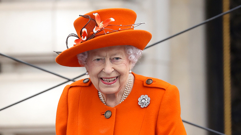 Queen Elizabeth wearing orange