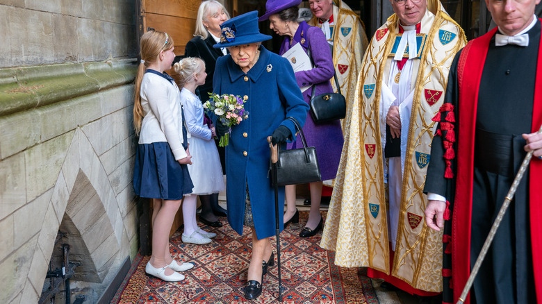 Queen Elizabeth with a cane