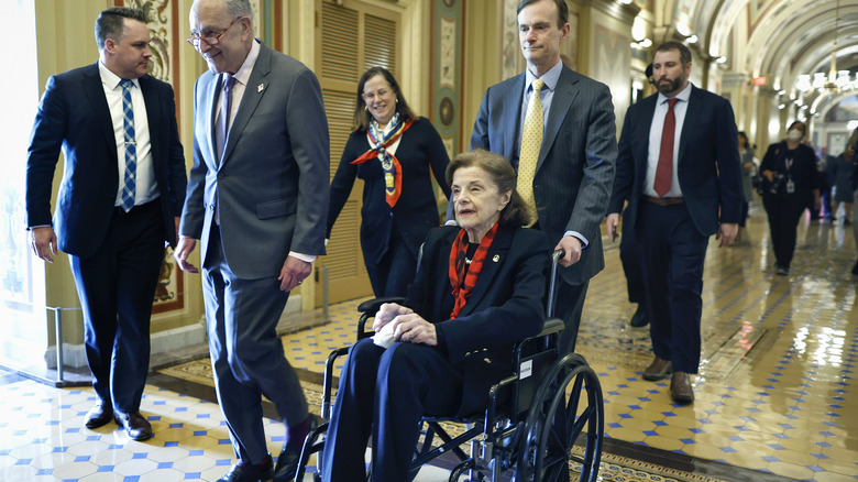 Dianne Feinstein escorted in wheelchair 