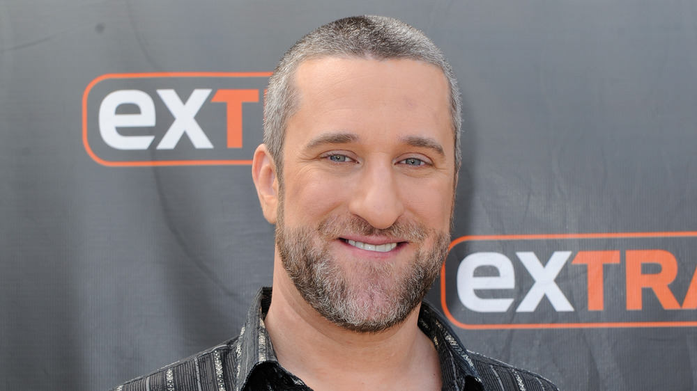 Dustin Diamond posing at event