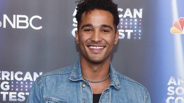 Devin Way smiling on an "American Song Contest" carpet