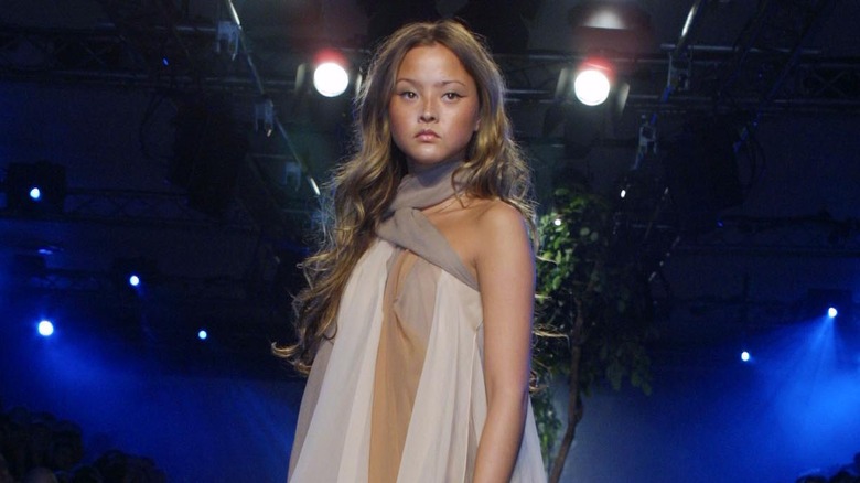 Devon Aoki on a runway 