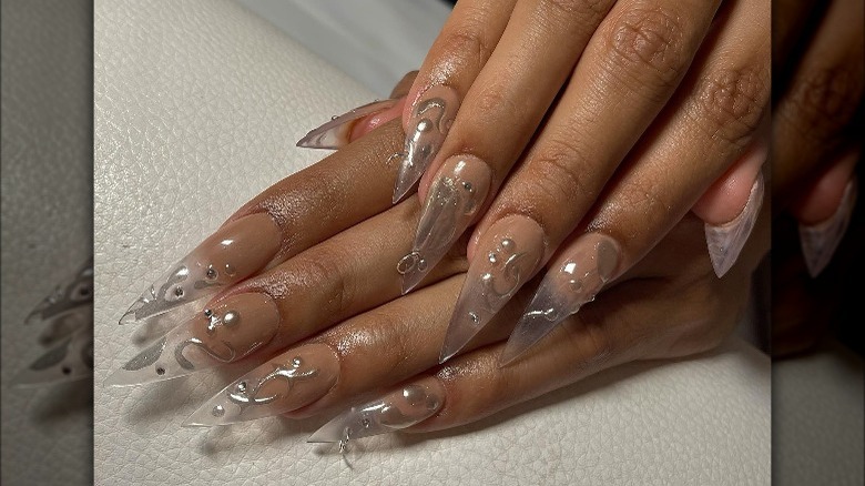 Silver details dewdrop nail design