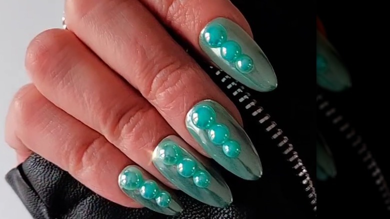 Green nails with charms