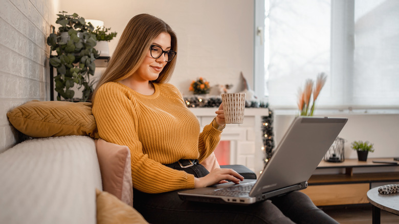 woman researching on laptop