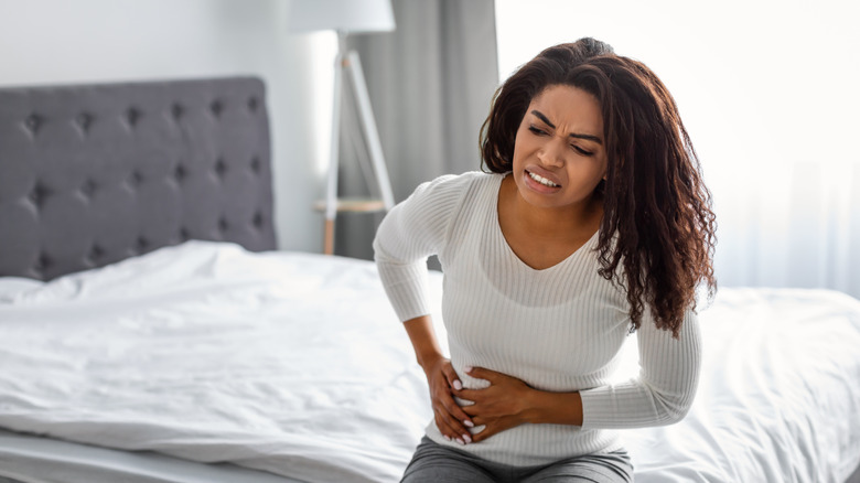 woman experiencing painful endometriosis symptoms