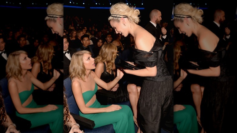 Taylor Swift and Dianna Agron talking at event