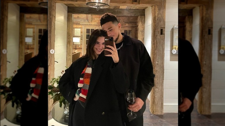 Kendall Jenner and Devin Booker hugging during new year's trip