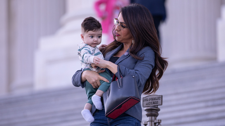 Lauren Boebert holding her grandson