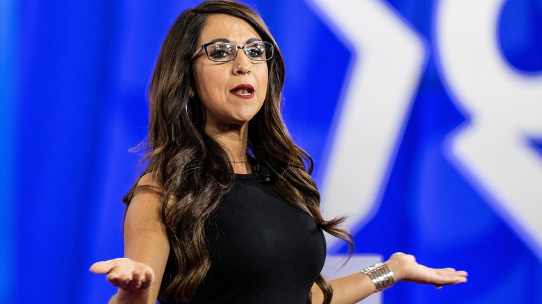 Lauren Boebert shrugs during a CPAC Texas 2022 conference