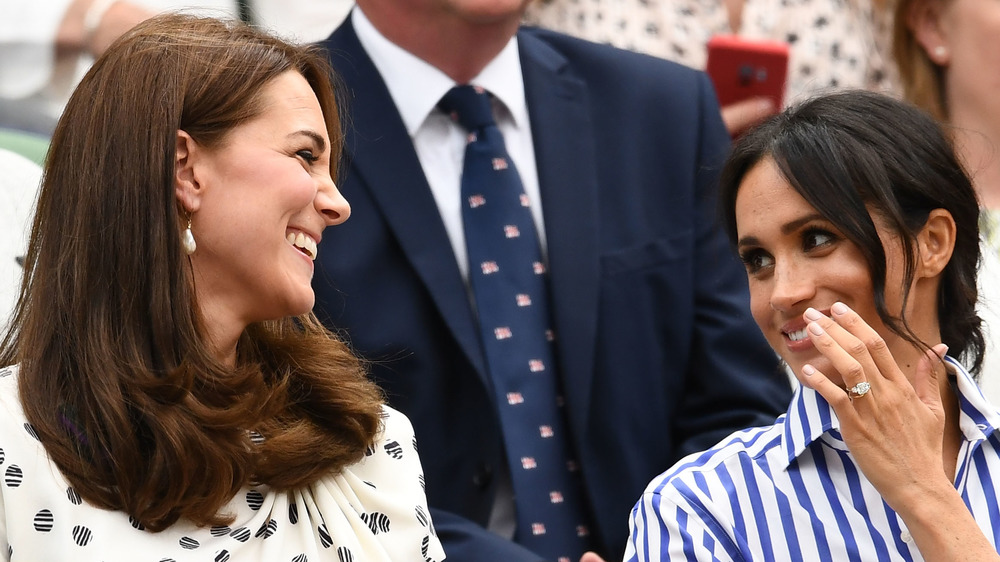 Meghan Markle and Kate Middleton share a laugh together