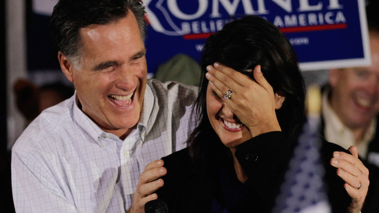 Mitt Romney and Nikki Haley laughing