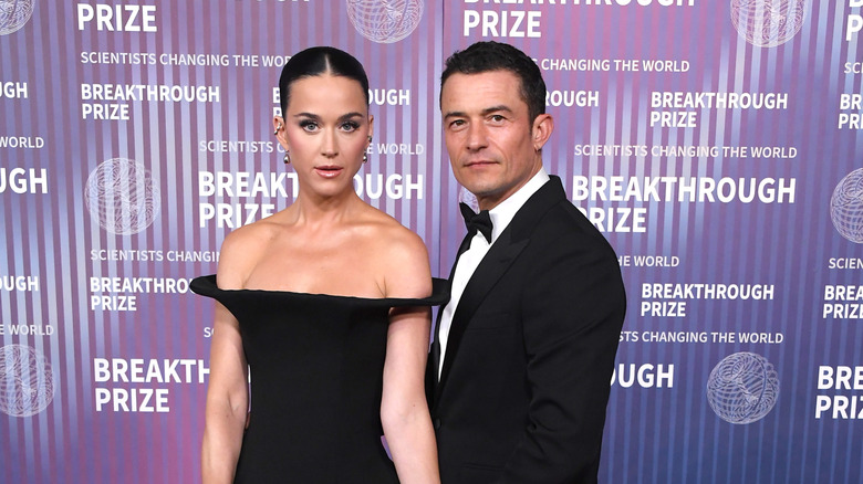 Katy Perry and Orlando Bloom posing on the red carpet