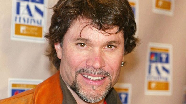 Peter Reckell poses at an event. 