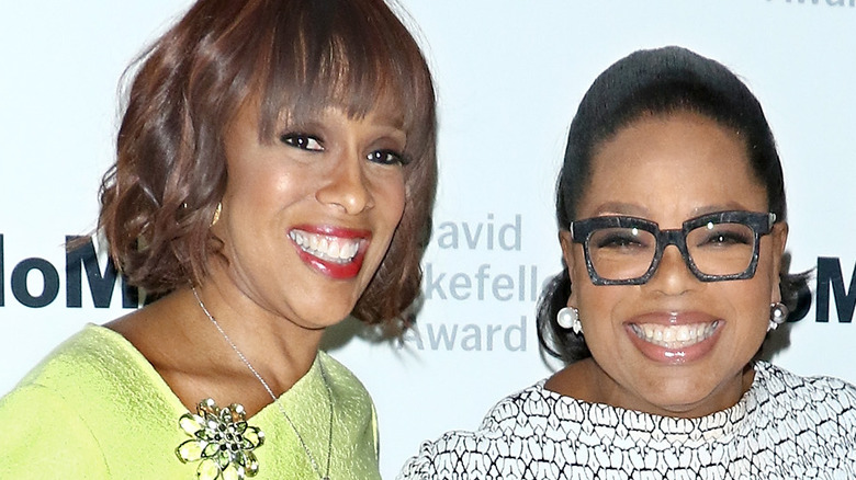 Oprah Winfrey and Gayle King smiling at an event