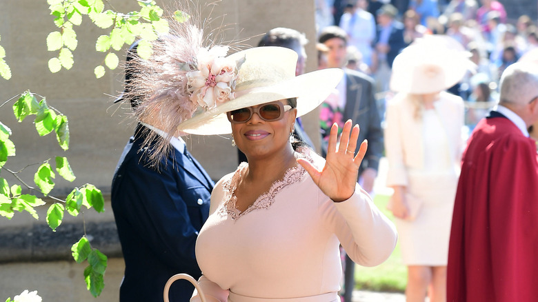 Oprah Winfrey waves at Meghan and Harry's wedding