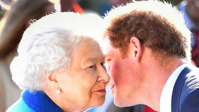 Prince Harry with Queen Elizabeth in London.