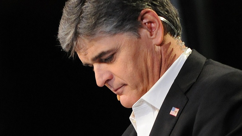 Sean Hannity looking down