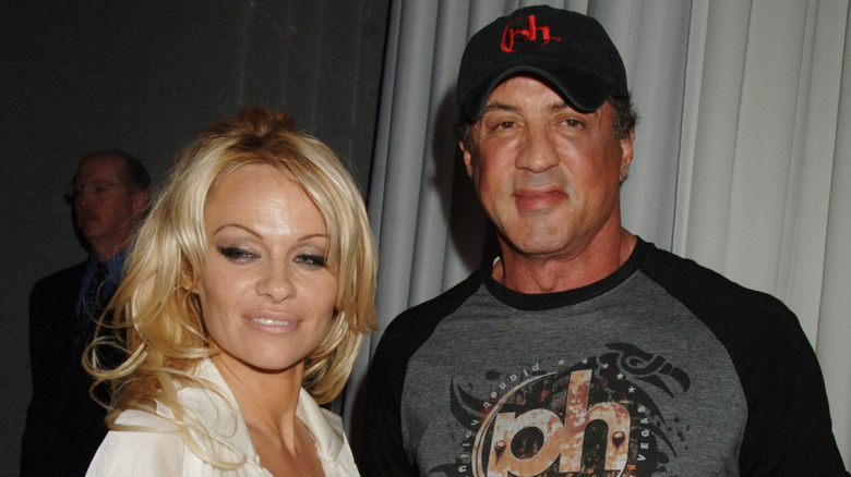 Pamala Anderson standing next to Sylvester Stallone