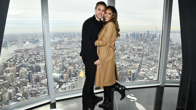 Tayshia Adams and Zac Clark posing together