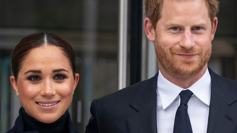 Prince Harry and Meghan Markle smiling